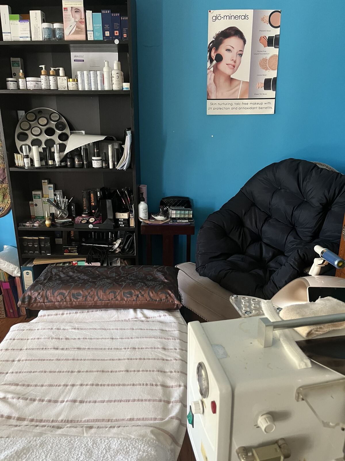 Skincare studio with treatment bed and Neogenesis skincare range